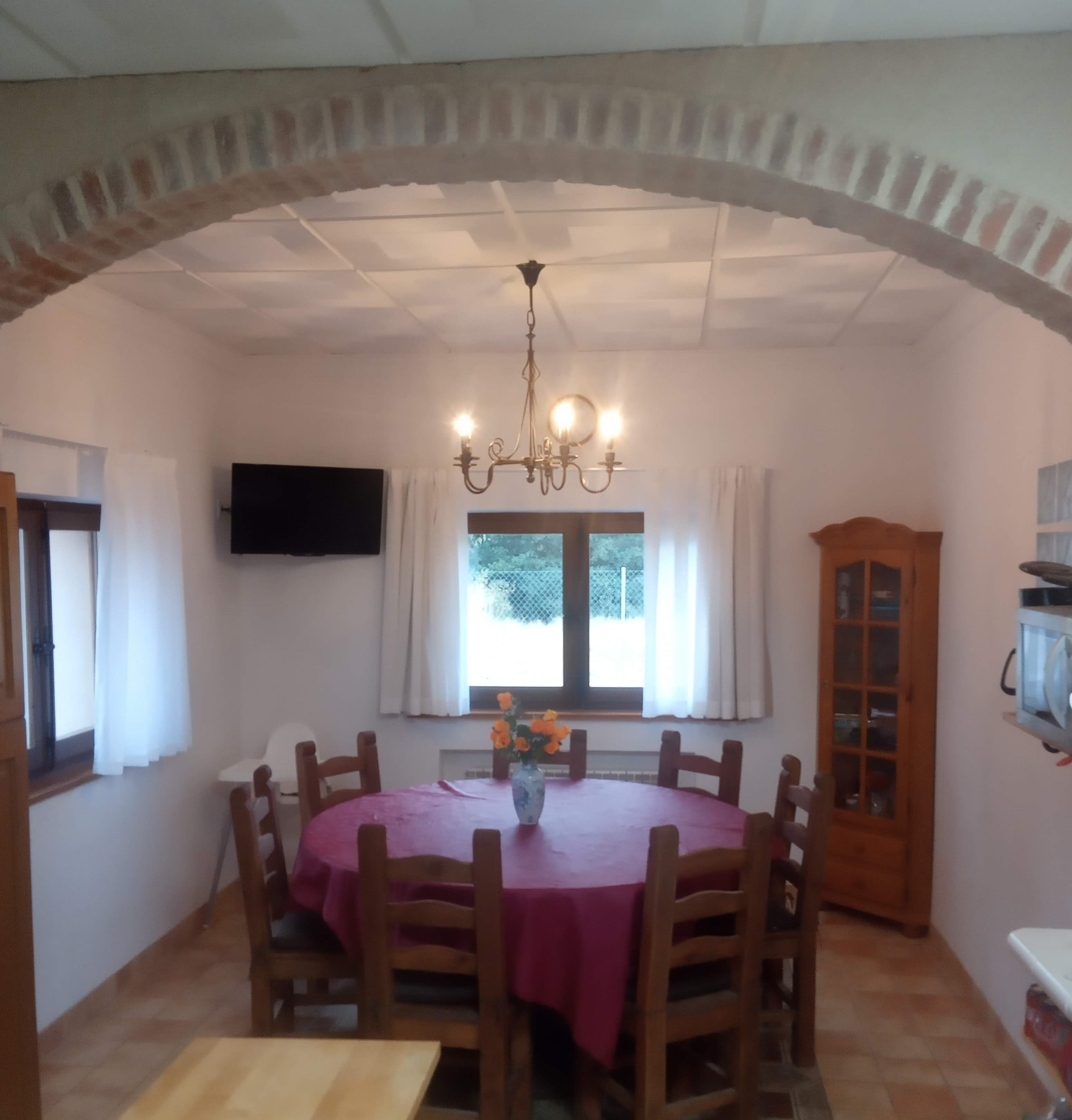 Comedor arco ladrillo
